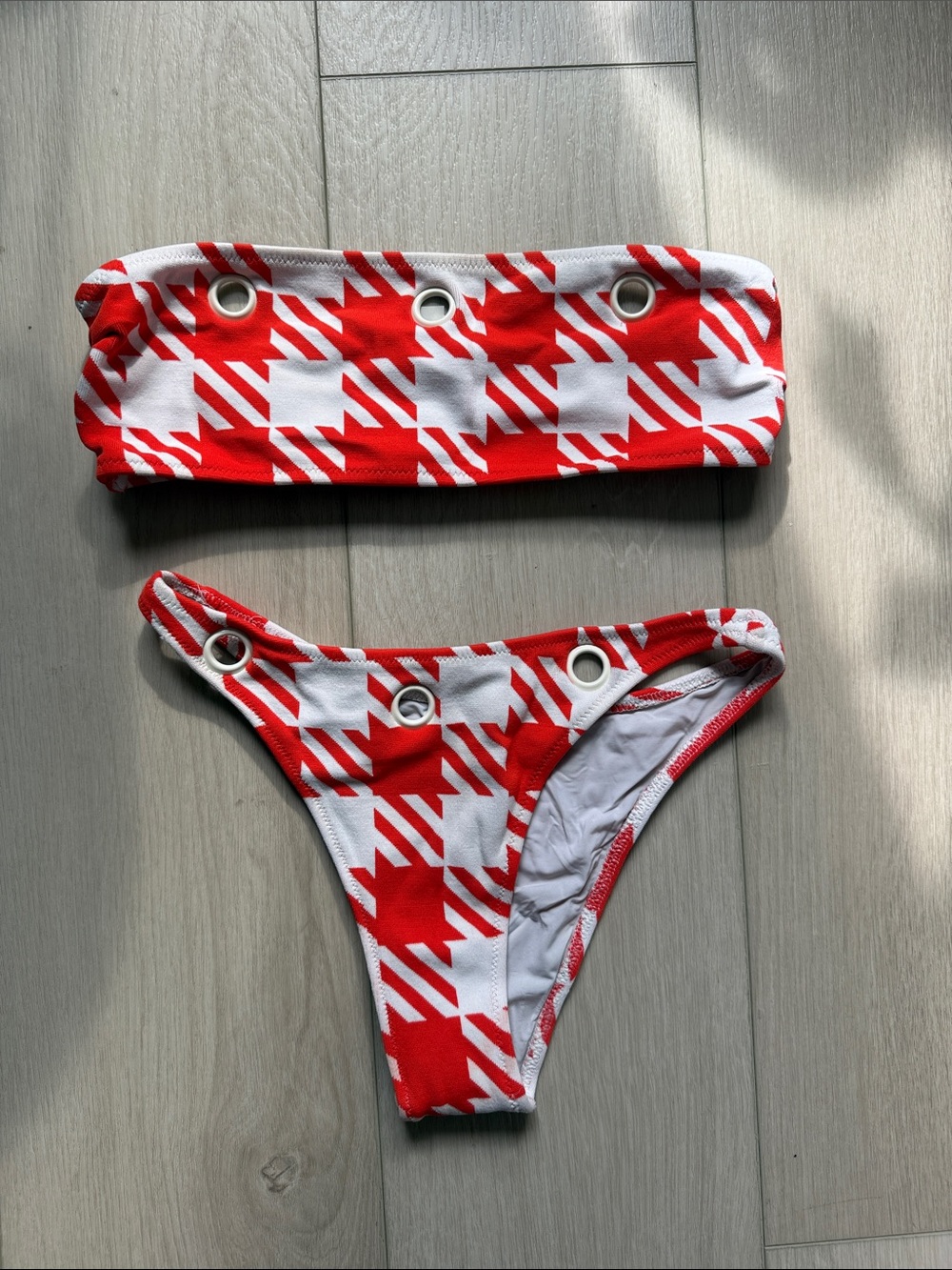 SOLID & STRIPED Red and White Grommet Bandeau Bikini